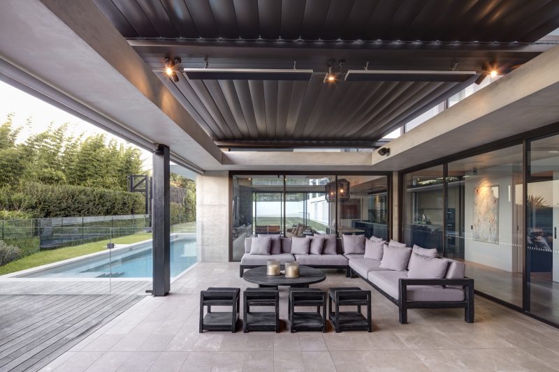 Outdoor-Entertaining-Area-With-View-To-Pool-And-Privacy-Screening